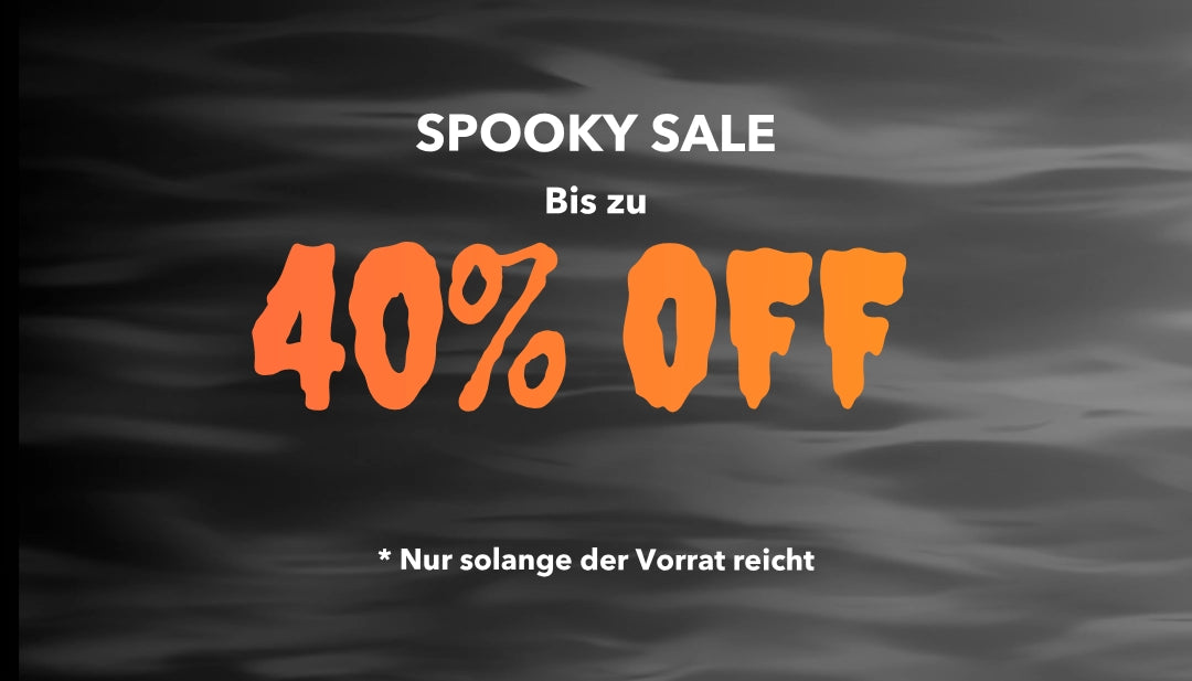 White and orange text reading "Spooky Sale: Up to 40% Off. *While supplies last" is visible against a black, foggy background.