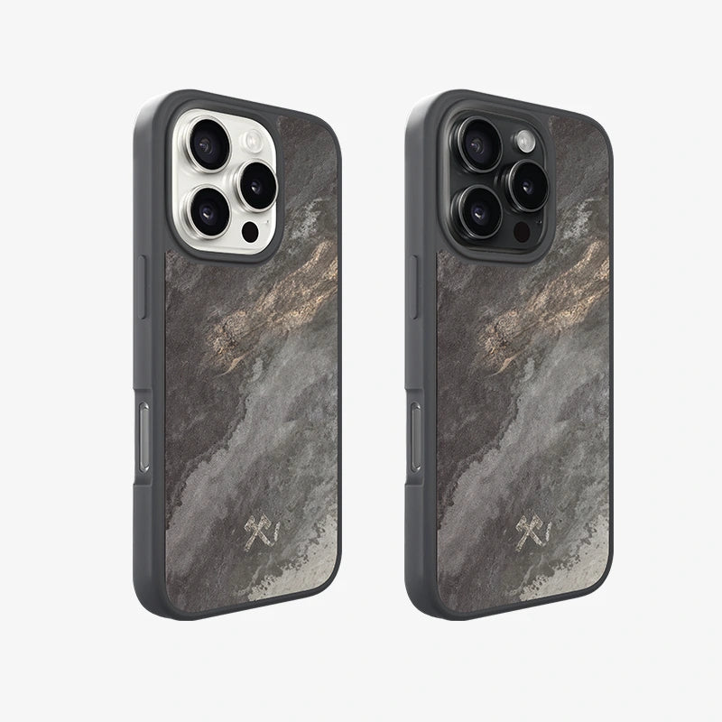 Deux modèles d'iPhone 16 Pro, argenté et noir, dans un cadre « Bumper Case » avec une pierre d'ardoise, placés côte à côte sur un fond clair.   